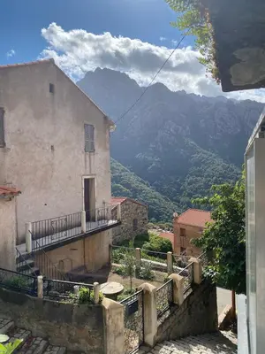 a view of the mountains from a building at OTA T2 proche rivières et plages, randonnées in Guaita