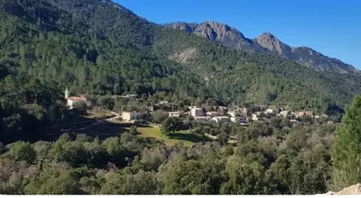 a small village in the middle of a mountain at Appartement Caprunale Rivière & Maquis in Manso