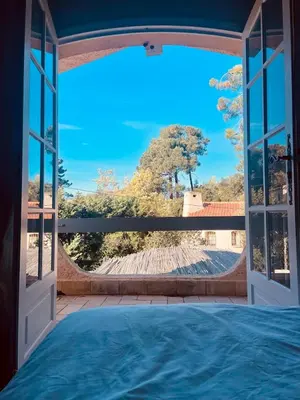 a view from a window of a tub in a house at Villa Saint-Cyprien Corse in Lecci