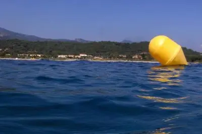 a yellow object in the middle of the water at Villa en Corse sur la Côte Est in Santa-Maria-Poggio