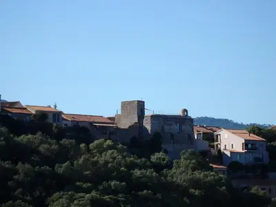 a castle on top of a hill at Appartement Cité Du Sel in Porto-Vecchio