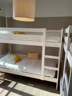 a white bunk bed in a childs room at Villa Petrera in Valle-di-Campoloro