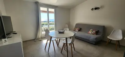 a living room with a table and a couch at I Casetti in Molini