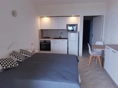 a small kitchen with a bed in a room at I Casetti in Molini