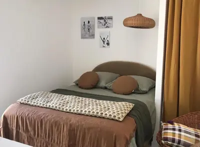 a bed with two pillows on it in a room at Casa di a felicita in Bonifacio