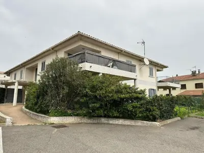 a house with a balcony on top of it at Appart, résidentiel penta-di-Casinca in Penta-di-Casinca