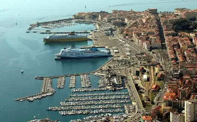 an aerial view of a harbor with a cruise ship at appartement flottant in Ajaccio