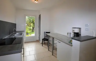 a kitchen with a sink and a counter top at 1 Bedroom Awesome Home In Vignale in Vignale