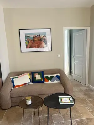 a living room with a couch and a table at A Casa Laetizia in Eccica-Suarella