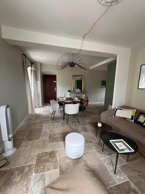a living room with a couch and a table at A Casa Laetizia in Eccica-Suarella