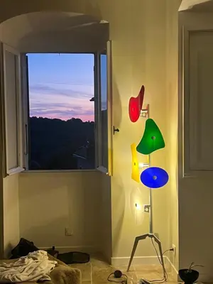a room with a window and a lamp in front of it at A Casa Laetizia in Eccica-Suarella