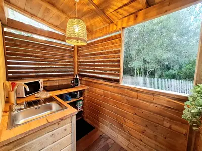 a kitchen with a sink and a window at Studio à Bonifacio in Bonifacio