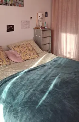 a bedroom with two twin beds and a dresser at Charmant cosy T3 in Ajaccio