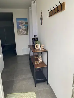 a room with a table with a one sign on it at Casa linsia in Aléria