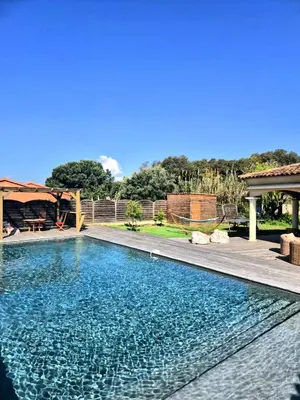 a swimming pool in the backyard of a house at A Bella Gaia in Cauro