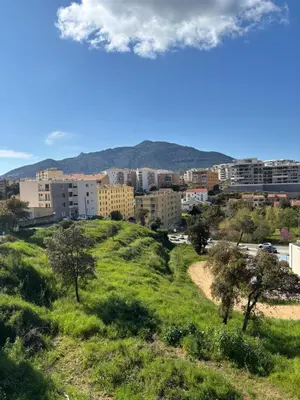 a view of the city from a hill at CHARMANT T3 Pietralba in Ajaccio