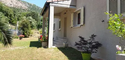 a house with a staircase leading to the backdoor at Villa Pastriccialone in Afa
