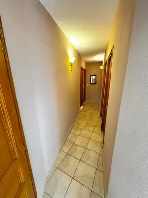 a hallway with a stairway leading into a room at Villa à Porto-Vecchio - Résidence privé in Porto-Vecchio