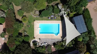 an overhead view of a swimming pool in a yard at Villa à Porto-Vecchio - Résidence privé in Porto-Vecchio