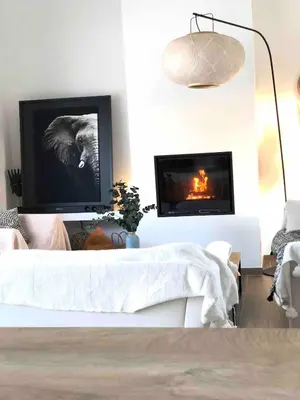 a living room with a couch and a tv at Beautiful villa, pool, sea, 5 bedrooms in Zonza