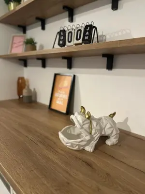 a pair of shoes sitting on top of a counter at I Sognu - Charmant Appartement Neuf Proche du Port in Porto-Vecchio