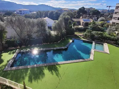 an overhead view of a swimming pool in a yard at Studio Port de Porto-Vecchio in Porto-Vecchio