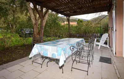 a table and chairs sitting on a patio at 1 Bedroom Nice Home In Vignale in Vignale