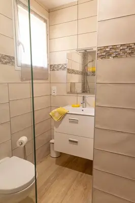 a bathroom with a toilet and a sink at Domaine de Campu in Vallecalle