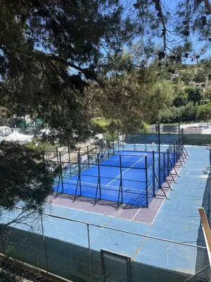 an overhead view of a tennis court at Appartement proche des plages de sable in Grosseto-Prugna