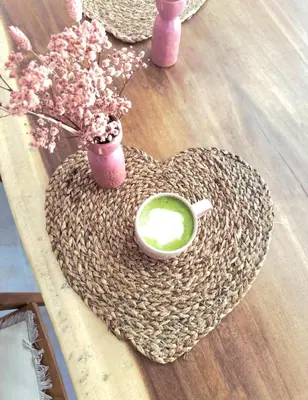 a table with a basket on a wooden shelf at Maison Mahana in Bonifacio