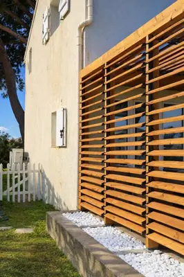 a body of water with a beach and the ocean at Maison calme au bord de l'eau in Lucciana