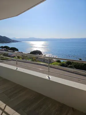 a view of the ocean from a bridge at Chez Vicky, superbe appartement avec parking privé piscine et vue exceptionnelle in Ajaccio