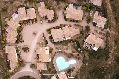 an overhead view of a group of houses at Villa 3 chambres dans résidence avec piscine in Porto-Vecchio