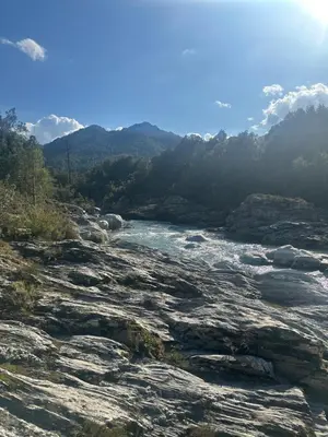 a view of a river with mountains in the background at Spacieuse villa standing de 220m2 in Aléria