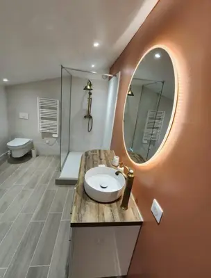 a bathroom with a sink and a mirror at T2 Sanguinaires - 150m de la mer in Ajaccio
