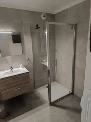 a bathroom with a shower and a sink at Appartement T3 , 6 couchages in Ajaccio