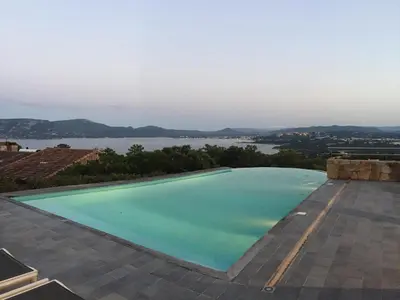 a swimming pool on the roof of a house at Marina di Fiori by Pinarello Villa Services in Furoli