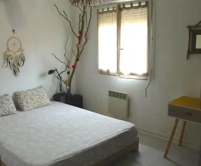a bedroom with a bed and a window at Villa ALOHA pool-beach 500m in Santa-Maria-Poggio
