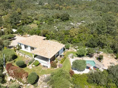 an aerial view of a house with a swimming pool at Villa MARE E MACCHIA in Lecci