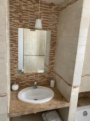 a bathroom with a sink and a mirror at Valle Di Casa in Sotta