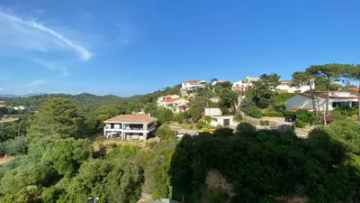 a house on a hill with houses on it at Confort et modernité Ajaccio in Ajaccio