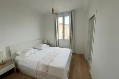 a kitchen with a table and chairs in a room at Aurélie - Charming 1Br Trottel Beach - by TGB in Ajaccio