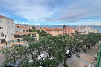 a view of a city with trees and buildings at Aurélie - Charming 1Br Trottel Beach - by TGB in Ajaccio