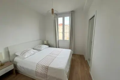 a living room with a couch and a table at Aurélie - Charming 1Br Trottel Beach - by TGB in Ajaccio