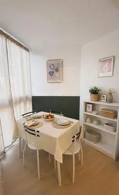 a kitchen with a washing machine and a sink at Grand studio neuf, lumineux et au calme ! Tout équipé - Ajaccio in Ajaccio