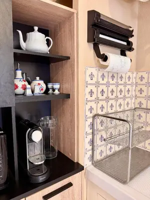 a kitchen with a sink and a counter top at Maison traditionnelle avec vues sur St Michel in Murato
