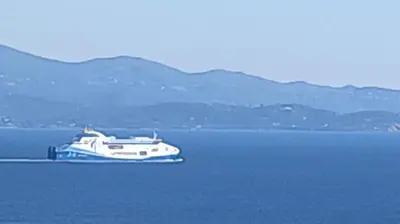 a boat sitting in the middle of the water at Ajaccio CATHEDRALE in Ajaccio