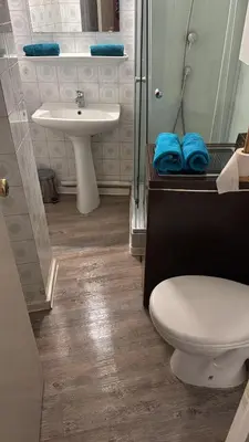 a bathroom with a toilet and a sink at Ajaccio CATHEDRALE in Ajaccio