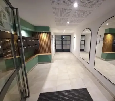 a corridor of a building with a hallway at A casa in Propriano