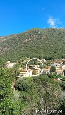 a view of a town on a mountain at Terra Corsa Duplex T2 in Porto Ota